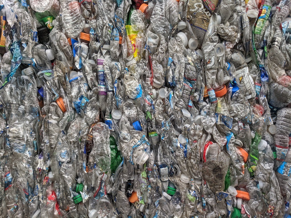 Post-consumer PET bottle sorting and processing